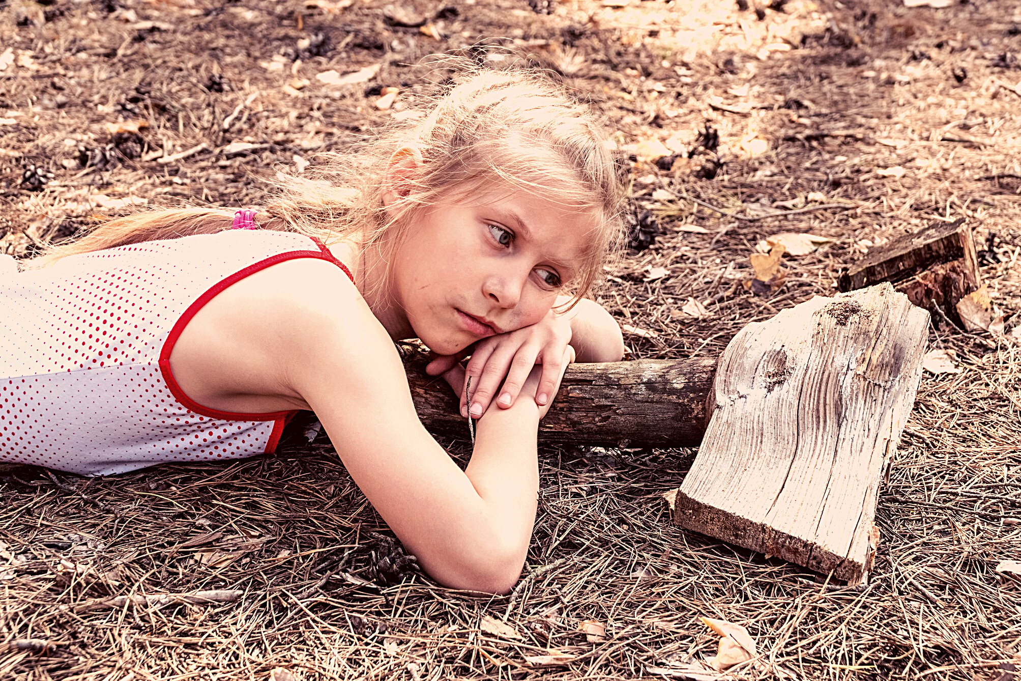 anxious child lies on the ground